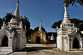 Bagan Myanmar. Shwezigon pagoda. The precinct is full of numerous images, inscribed bells, stone inscriptions and other paraphernalia.  